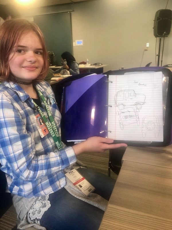 Kathleen Becker, a student at Stevenson Middle School, displays her Jeep®-inspired concept she drafted at this year’s GET IT Day.